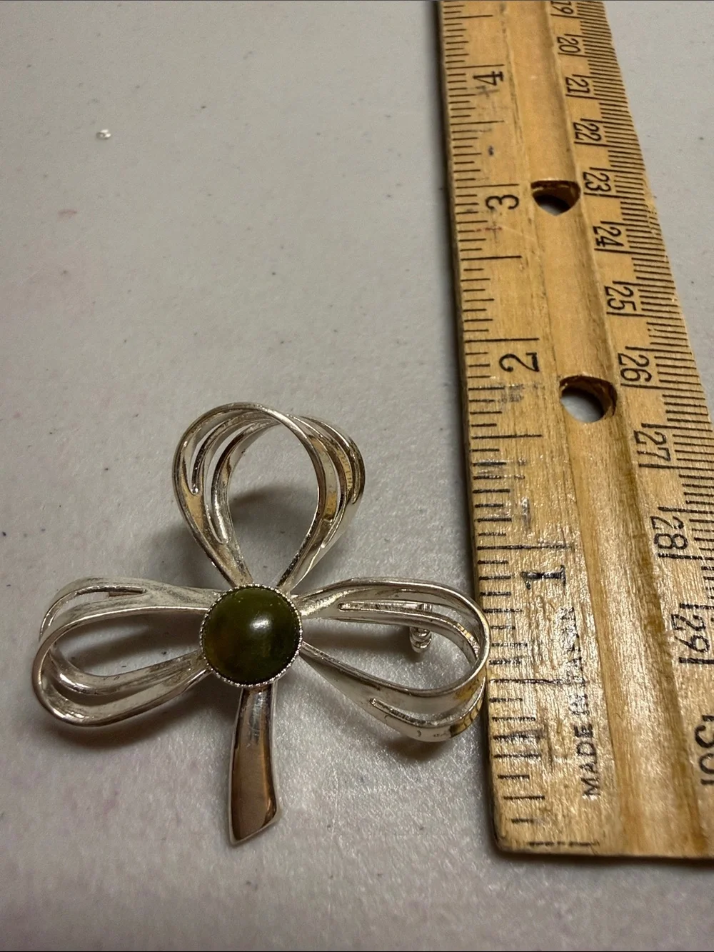 Silver Bow Brooch with Olive Green Center